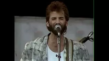 Play Kenny loggins - footloose - live 1985